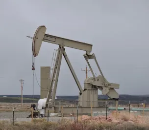 oil rig in a field in texas, Oil Field Injury Lawyer,
